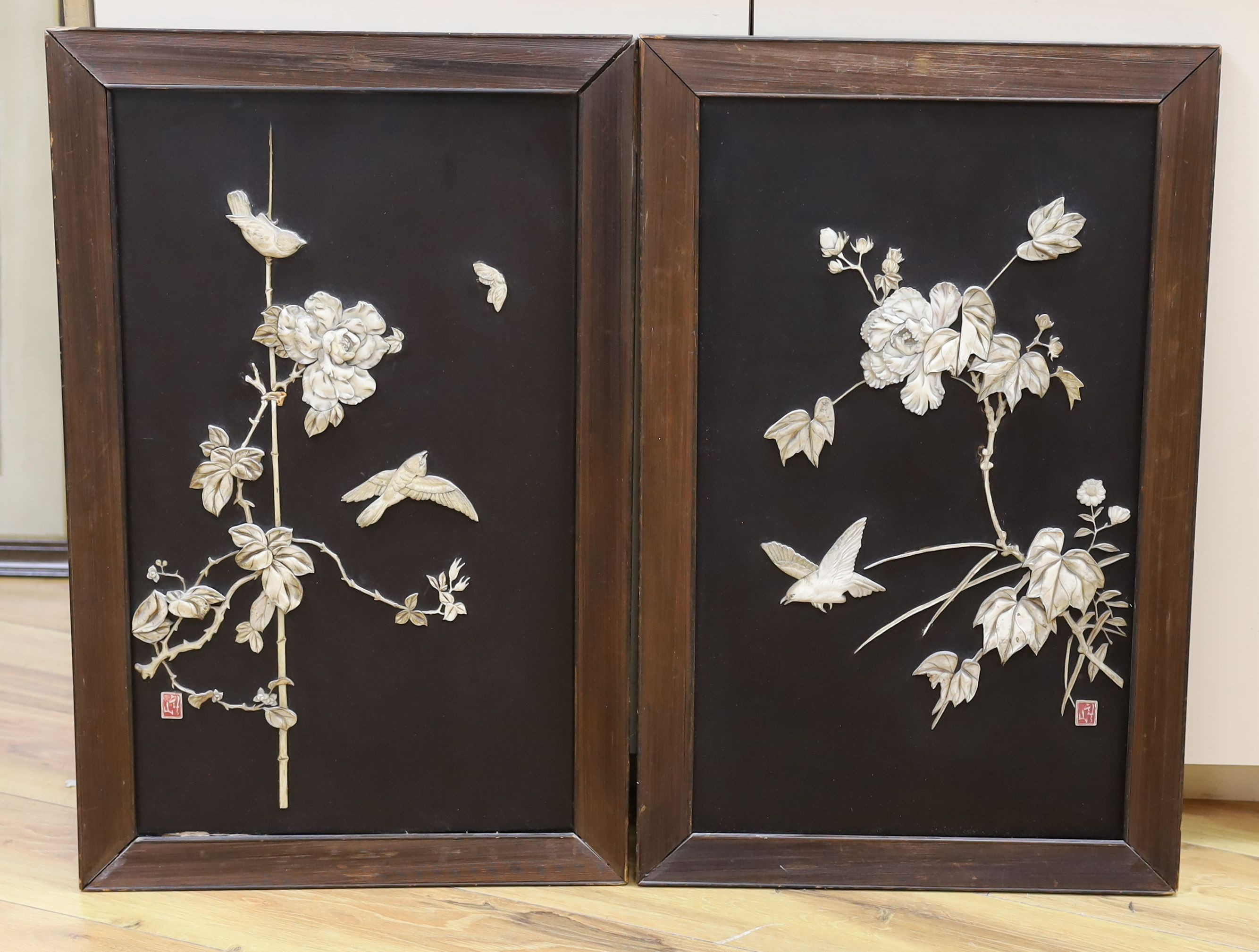 A pair of Japanese Meiji period ivory inlaid lacquered panels - 43.5 x 69cm